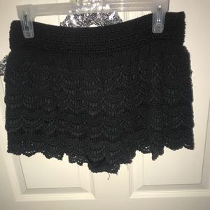 Black, ruffled lace “booty shorts”